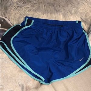 Blue Nike athletic shorts